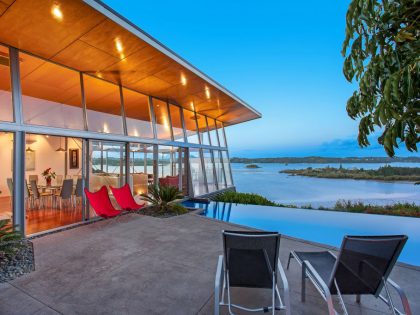 A Spacious Waterfront Home with Bold and Vibrant Interiors in Kerikeri by Richard Naish (1)