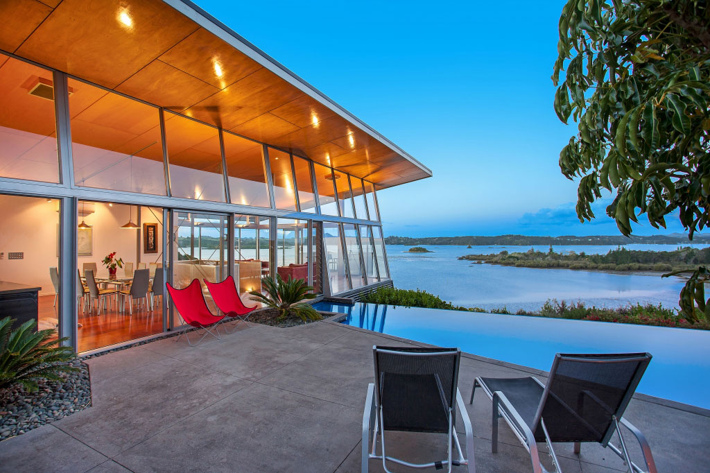 A Spacious Waterfront Home with Bold and Vibrant Interiors in Kerikeri by Richard Naish (1)