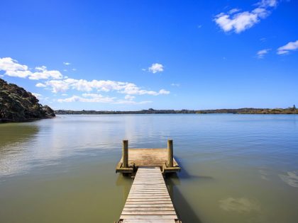 A Spacious Waterfront Home with Bold and Vibrant Interiors in Kerikeri by Richard Naish (14)