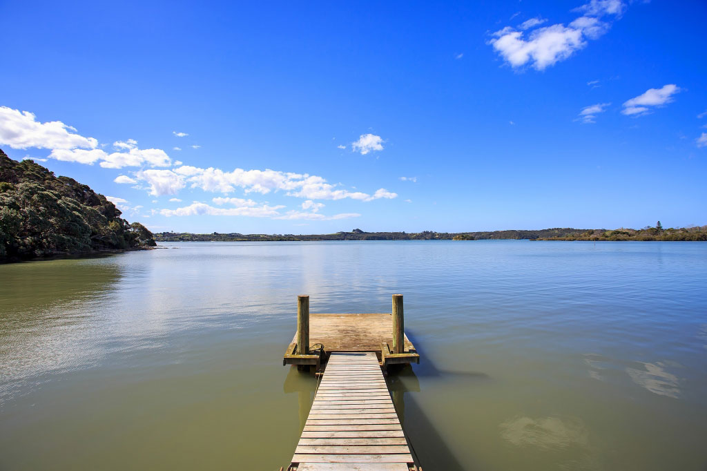 A Spacious Waterfront Home with Bold and Vibrant Interiors in Kerikeri by Richard Naish (14)
