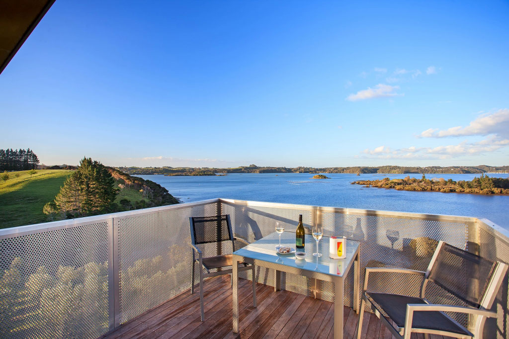 A Spacious Waterfront Home with Bold and Vibrant Interiors in Kerikeri by Richard Naish (16)