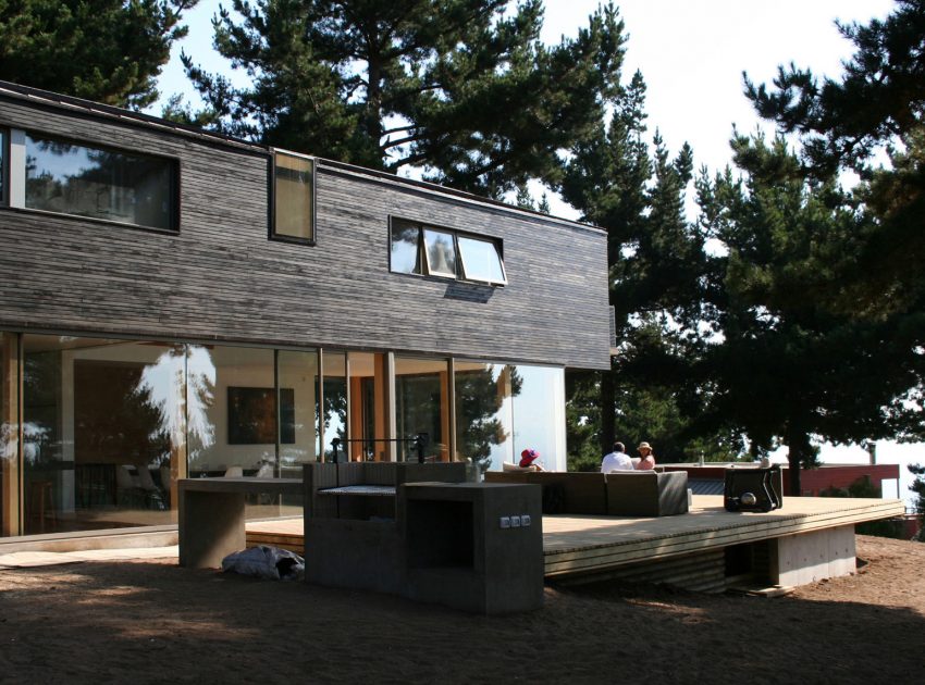 A Spacious and Warm Modern Home Embraced by a Forest of Pines in Zapallar by Raimundo Anguita (5)