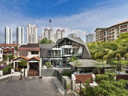 A Spacious and Warm Semi-Detached House with Angular Pitched Canopy in Singapore