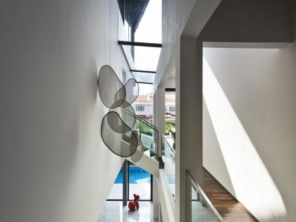 A Spacious and Warm Semi-Detached House with Angular Pitched Canopy in Singapore by A D Lab (11)