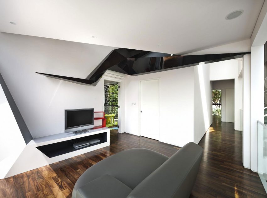 A Spacious and Warm Semi-Detached House with Angular Pitched Canopy in Singapore by A D Lab (13)
