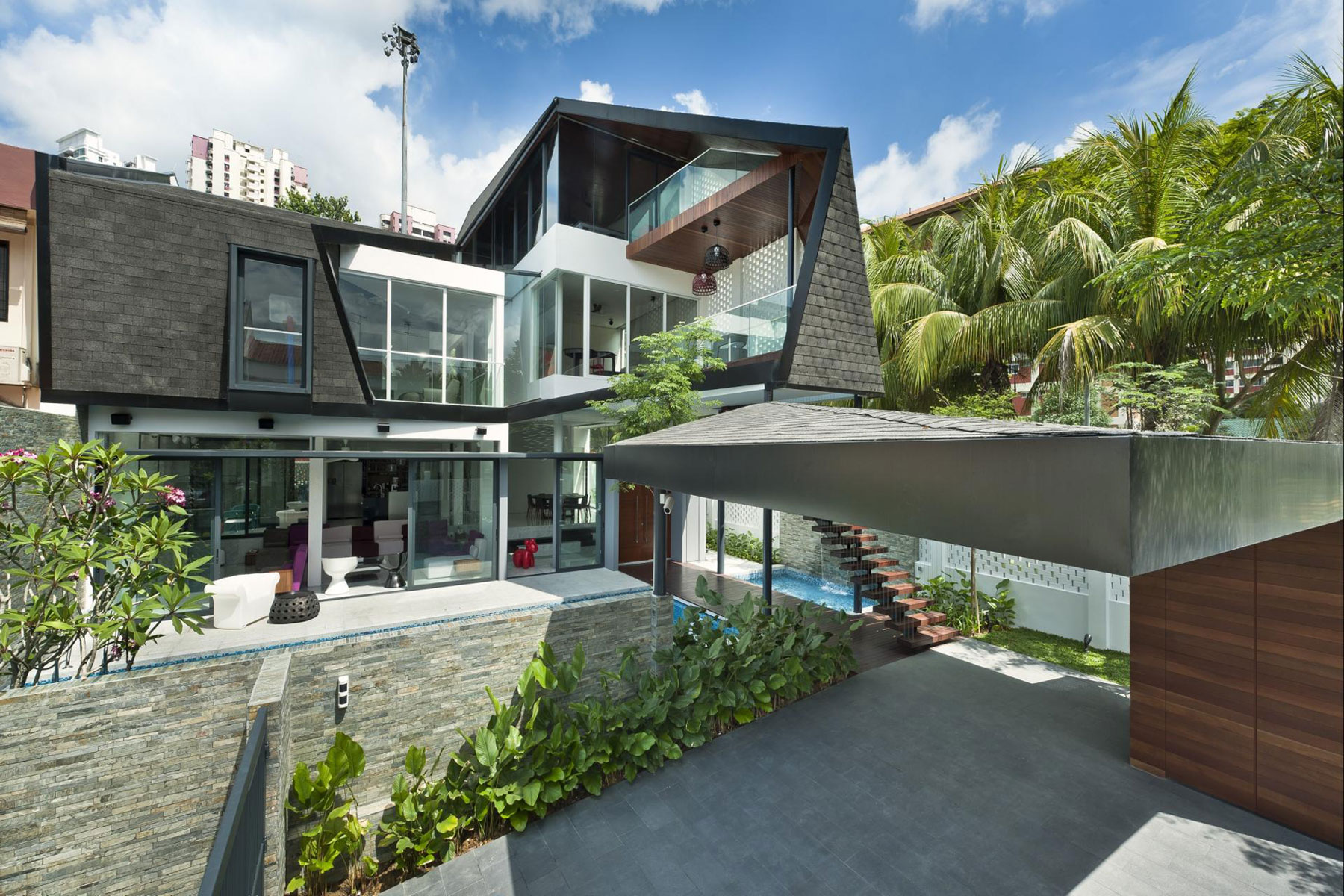A Spacious and Warm Semi-Detached House with Angular Pitched Canopy in Singapore by A D Lab (2)