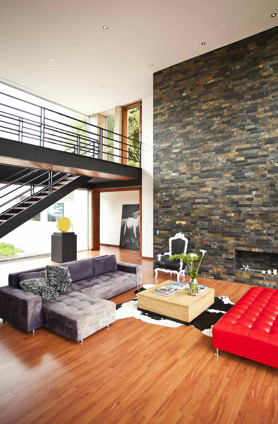 A Striking Contemporary Home Separated by a Stunning Black Stone Walls in Llano Grande, Colombia by David Ramirez (11)