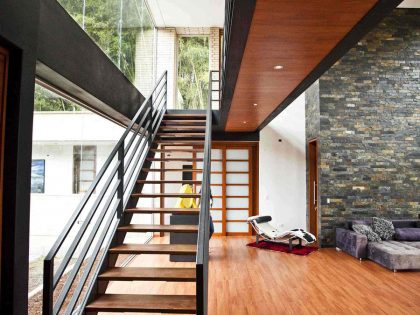 A Striking Contemporary Home Separated by a Stunning Black Stone Walls in Llano Grande, Colombia by David Ramirez (13)