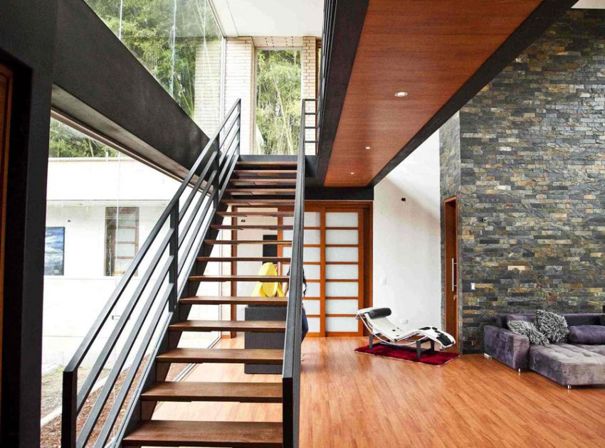 A Striking Contemporary Home Separated by a Stunning Black Stone Walls in Llano Grande, Colombia by David Ramirez (13)