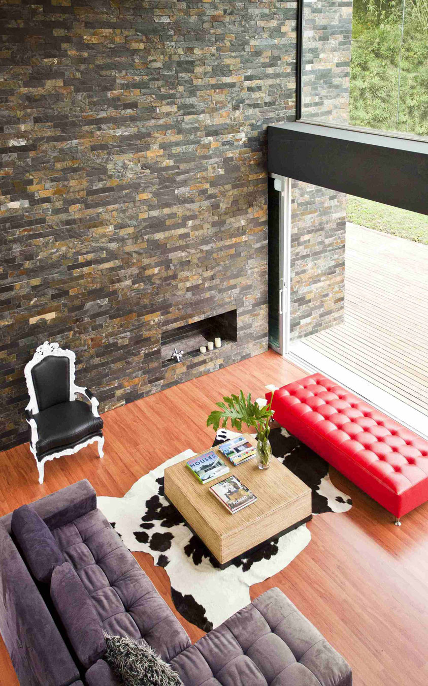 A Striking Contemporary Home Separated by a Stunning Black Stone Walls in Llano Grande, Colombia by David Ramirez (14)
