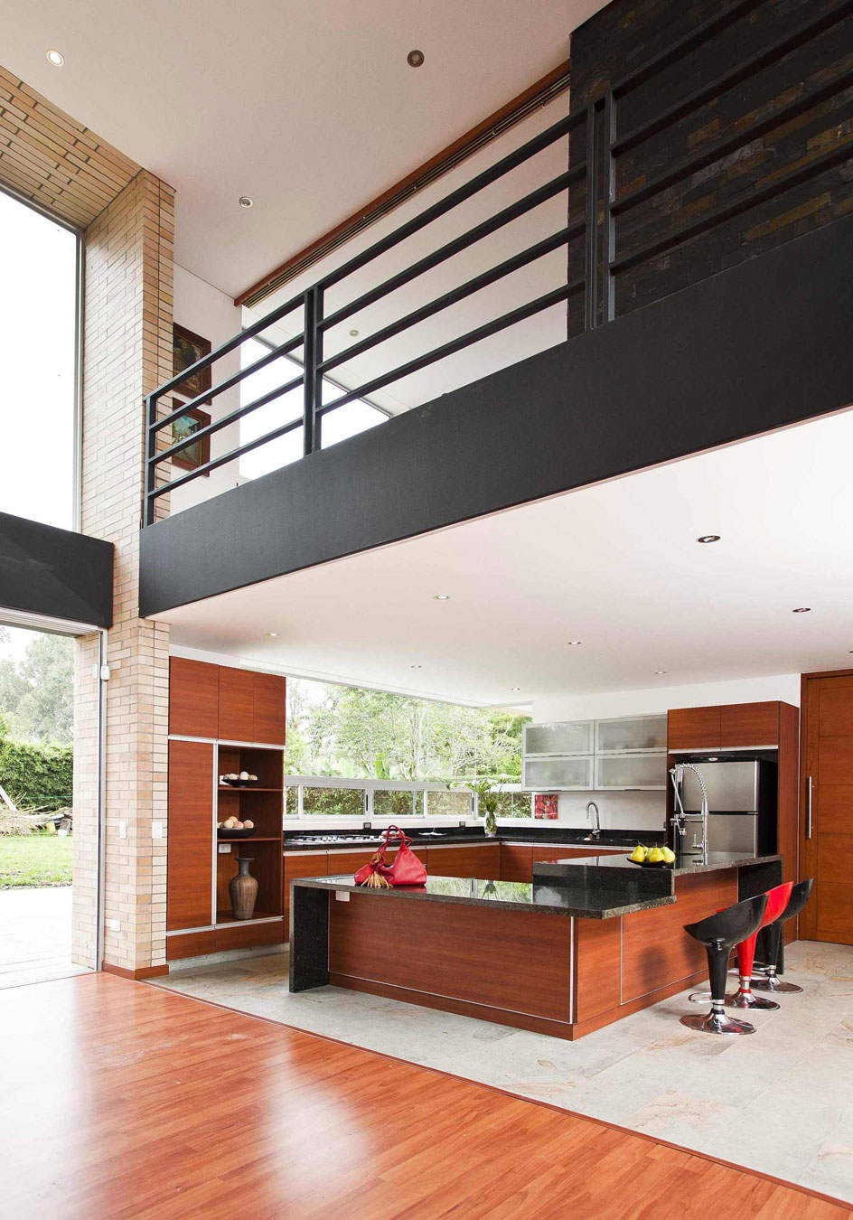 A Striking Contemporary Home Separated by a Stunning Black Stone Walls in Llano Grande, Colombia by David Ramirez (15)