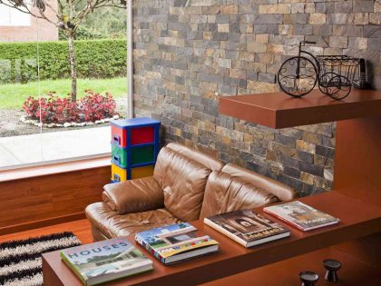 A Striking Contemporary Home Separated by a Stunning Black Stone Walls in Llano Grande, Colombia by David Ramirez (19)