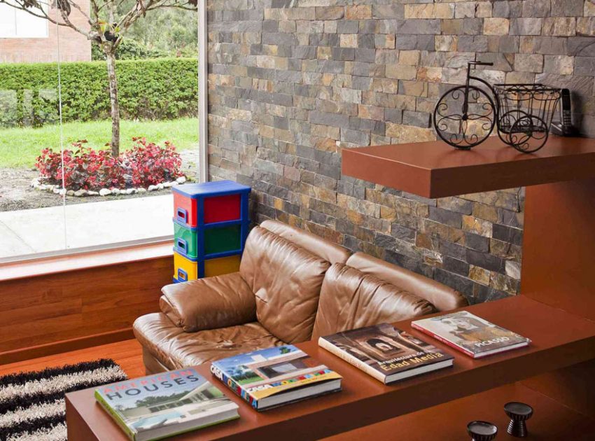 A Striking Contemporary Home Separated by a Stunning Black Stone Walls in Llano Grande, Colombia by David Ramirez (19)