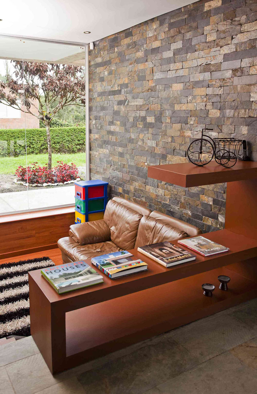 A Striking Contemporary Home Separated by a Stunning Black Stone Walls in Llano Grande, Colombia by David Ramirez (19)
