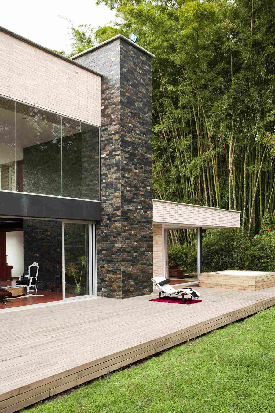 A Striking Contemporary Home Separated by a Stunning Black Stone Walls in Llano Grande, Colombia by David Ramirez (5)