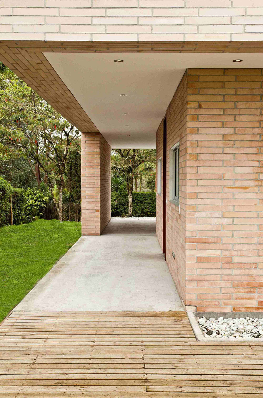 A Striking Contemporary Home Separated by a Stunning Black Stone Walls in Llano Grande, Colombia by David Ramirez (8)