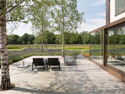 A Striking Minimalist Home Supported by Natural Light and Splendid Views in Balen, Belgium by Pascal François Architects (3)