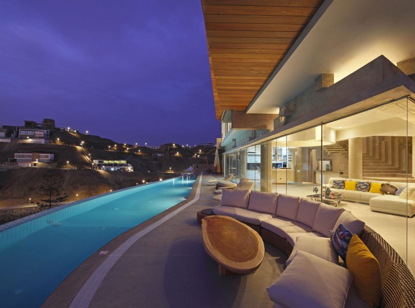 A Striking Modern Beach House on the Rocky Terrain in Lima, Peru by Longhi Architects (23)
