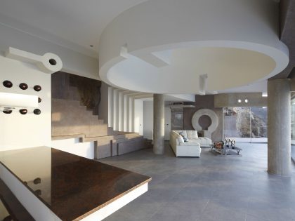 A Striking Modern Beach House on the Rocky Terrain in Lima, Peru by Longhi Architects (7)