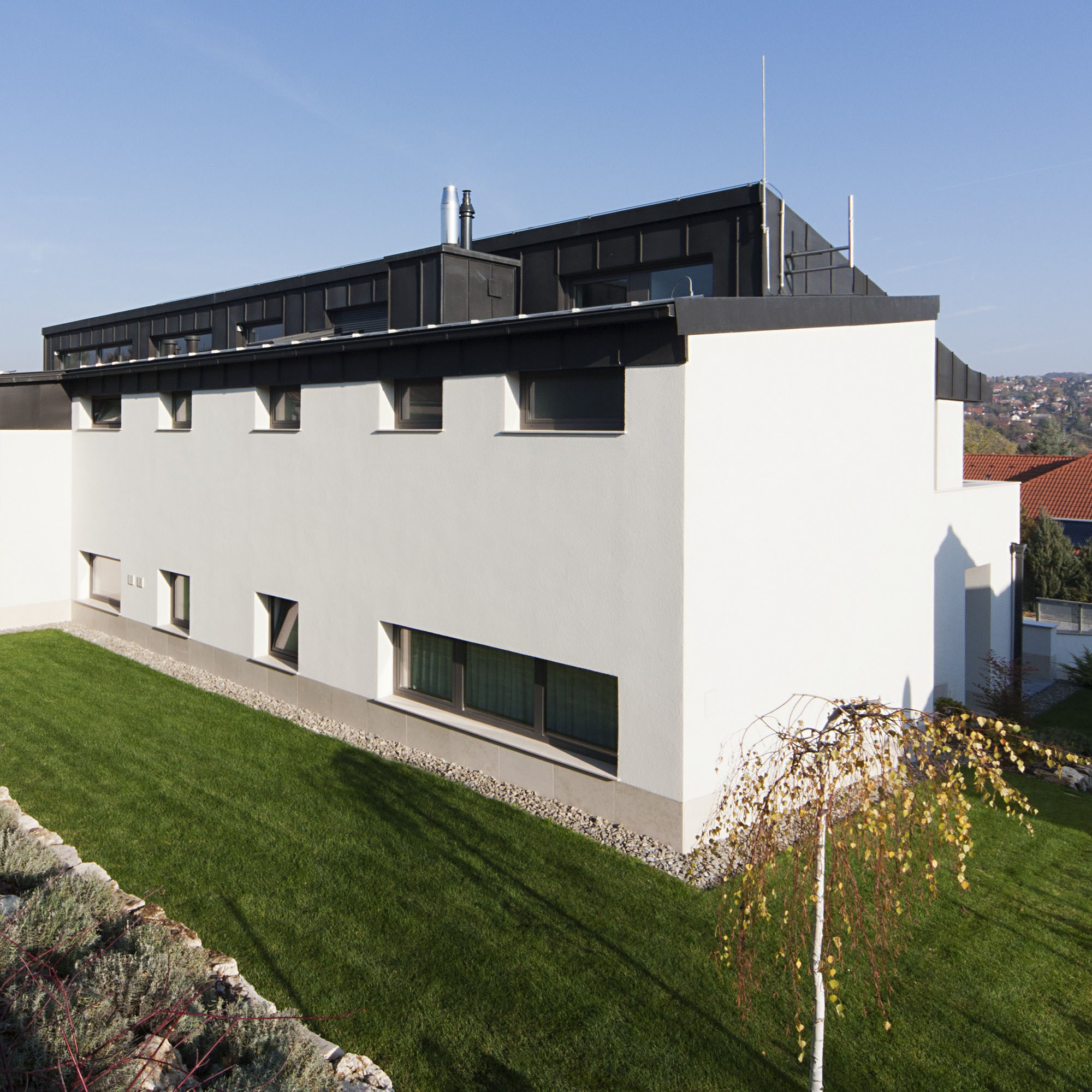 A Stunning Contemporary Home with Asymmetrical Facade and Unique Look in Budapest, Hungary by Sandor Duzs and Architema (5)