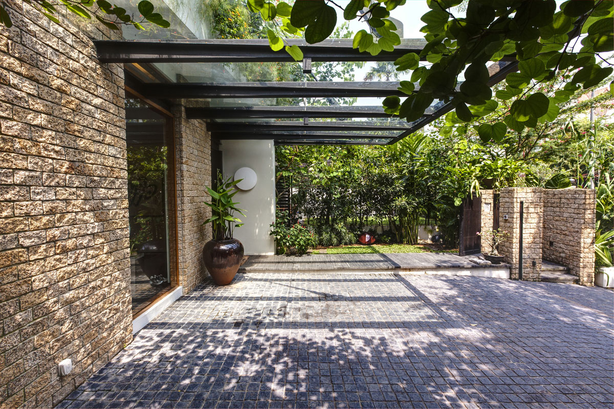 A Stunning House Surrounded by Lush Greenery and Courtyard Gardens in Singapore by Aamer Architects (12)