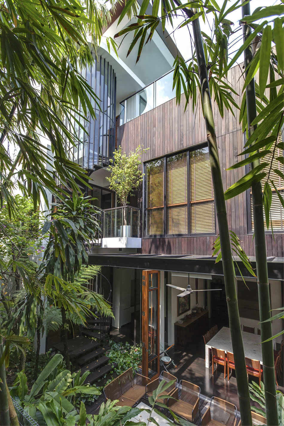 A Stunning House Surrounded by Lush Greenery and Courtyard Gardens in Singapore by Aamer Architects (13)