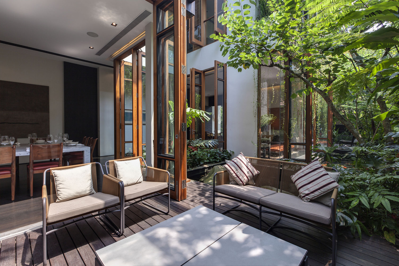 A Stunning House Surrounded by Lush Greenery and Courtyard Gardens in Singapore by Aamer Architects (14)