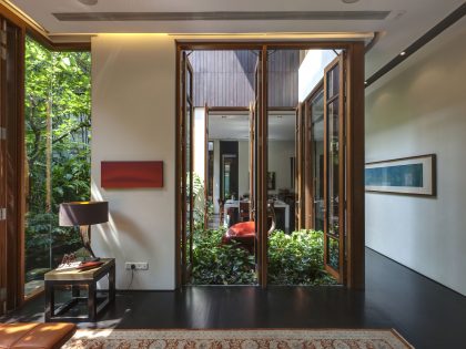 A Stunning House Surrounded by Lush Greenery and Courtyard Gardens in Singapore by Aamer Architects (19)