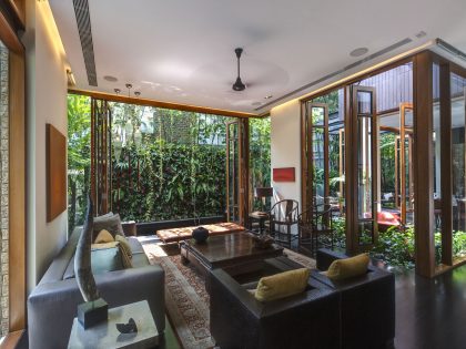 A Stunning House Surrounded by Lush Greenery and Courtyard Gardens in Singapore by Aamer Architects (22)