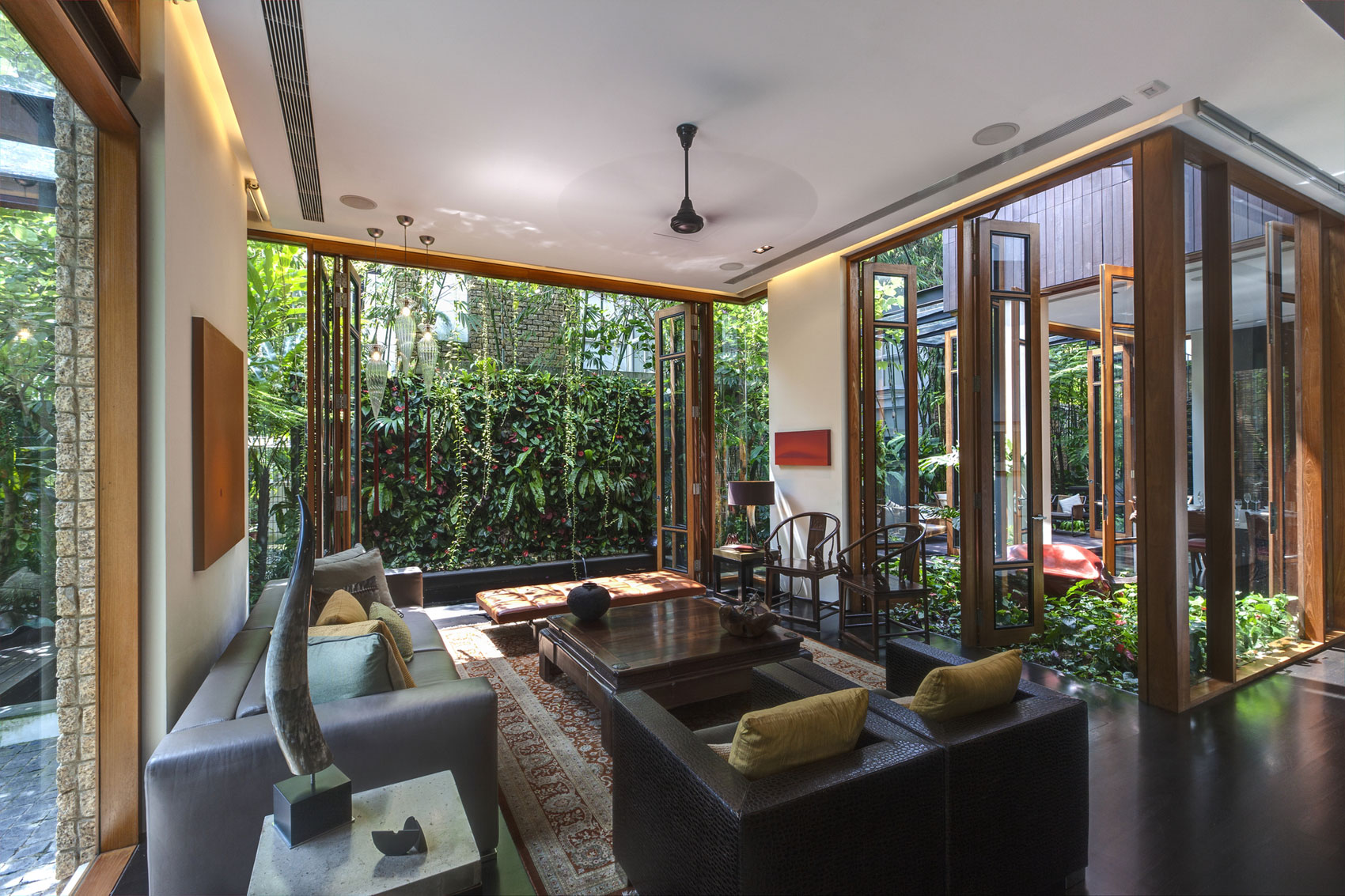 A Stunning House Surrounded by Lush Greenery and Courtyard Gardens in Singapore by Aamer Architects (22)