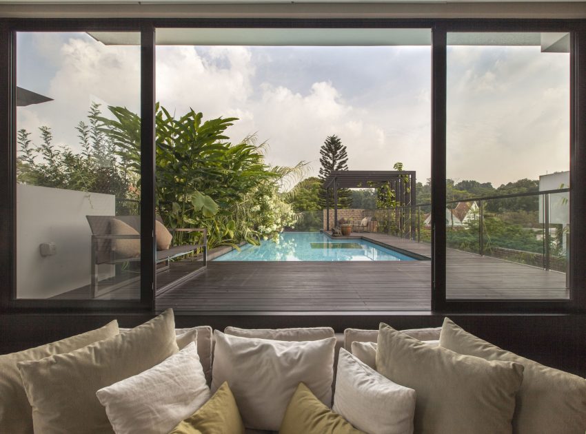 A Stunning House Surrounded by Lush Greenery and Courtyard Gardens in Singapore by Aamer Architects (23)