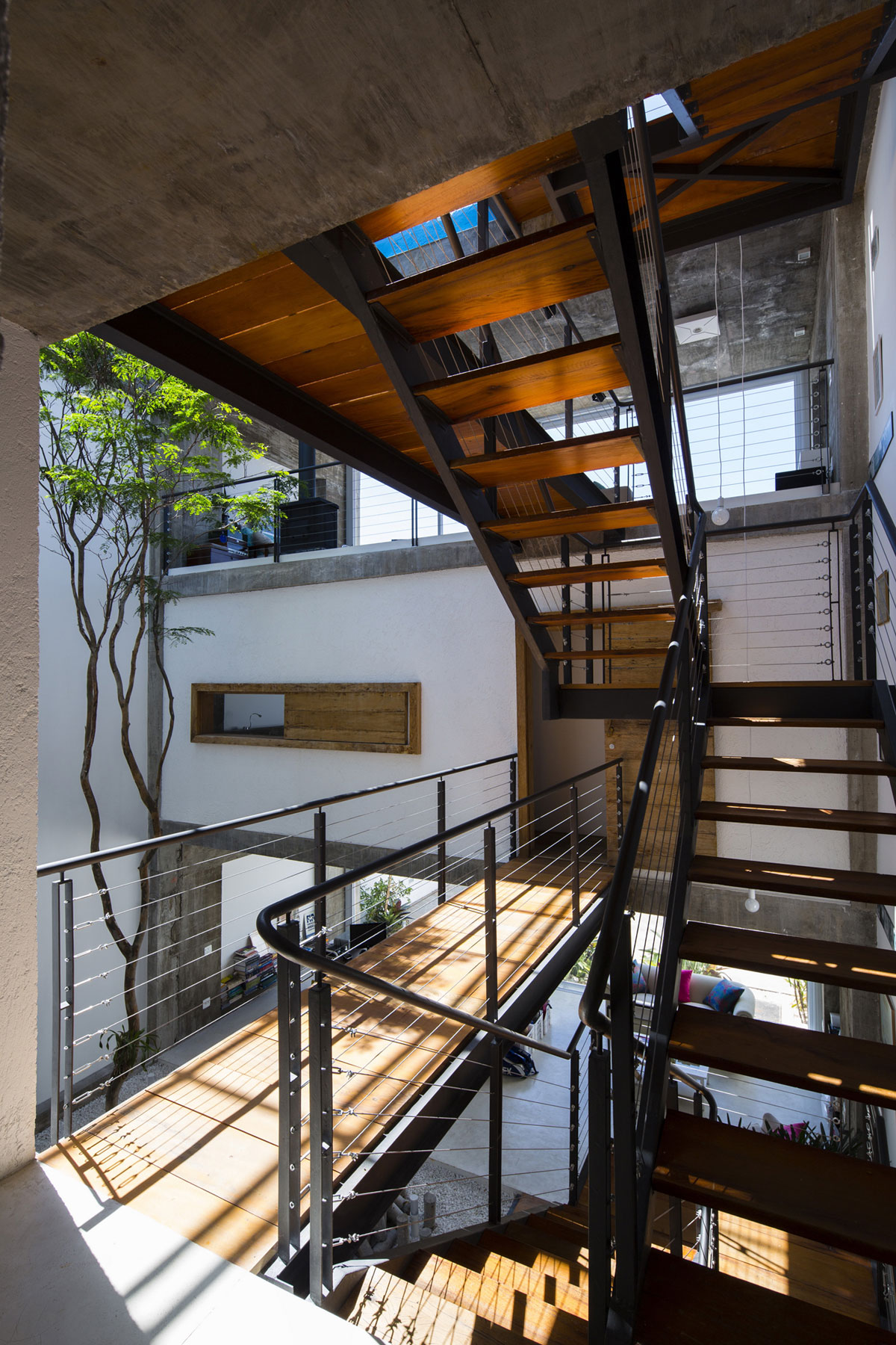 A Stunning Modern Home with Exposed Concrete and Industrial Style in São Paulo by Bonina Arquitetura (7)