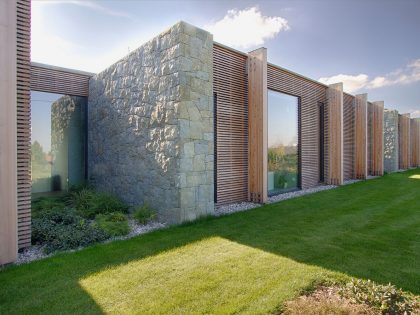 A Stylish Contemporary Home of Stone, Wood and Glass Elements in Palkovice, Czech Republic by Qarta Architektura (1)