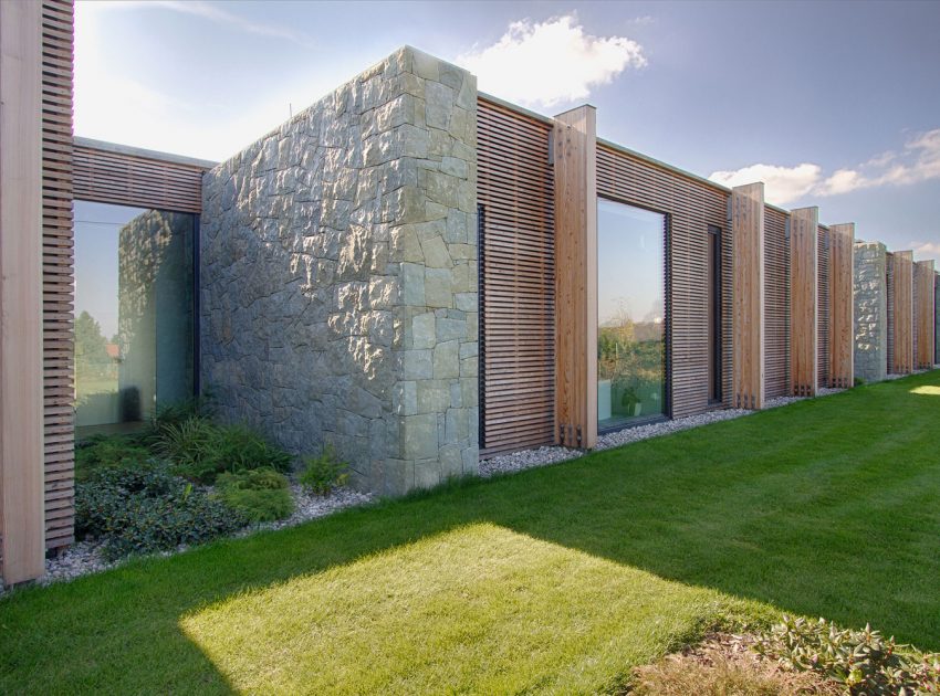 A Stylish Contemporary Home of Stone, Wood and Glass Elements in Palkovice, Czech Republic by Qarta Architektura (1)