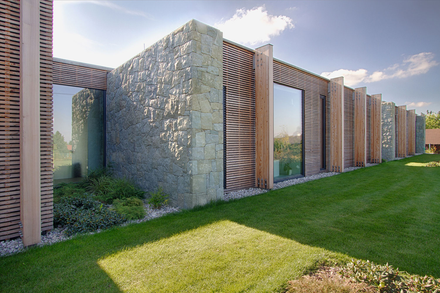 A Stylish Contemporary Home of Stone, Wood and Glass Elements in Palkovice, Czech Republic by Qarta Architektura (1)