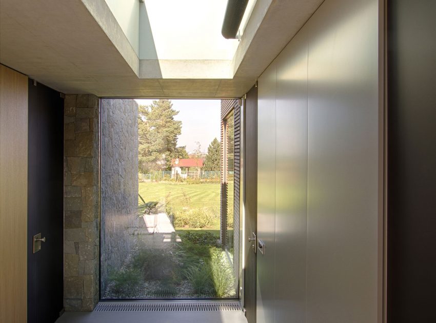 A Stylish Contemporary Home of Stone, Wood and Glass Elements in Palkovice, Czech Republic by Qarta Architektura (10)