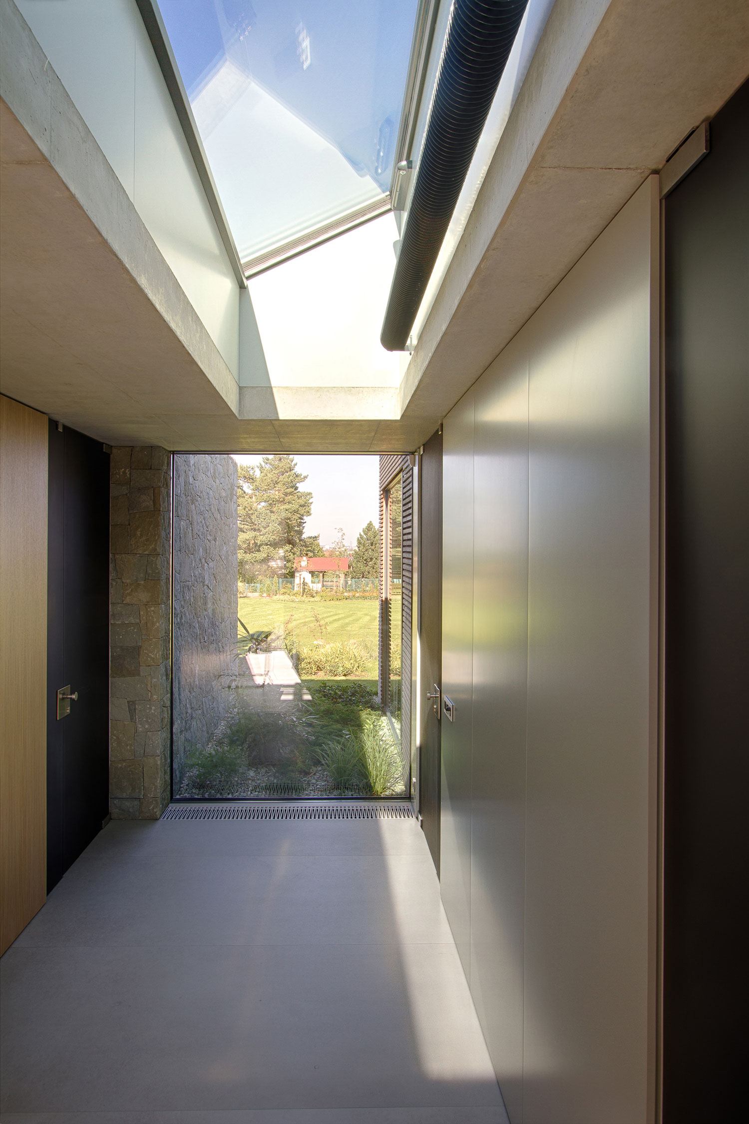 A Stylish Contemporary Home of Stone, Wood and Glass Elements in Palkovice, Czech Republic by Qarta Architektura (10)