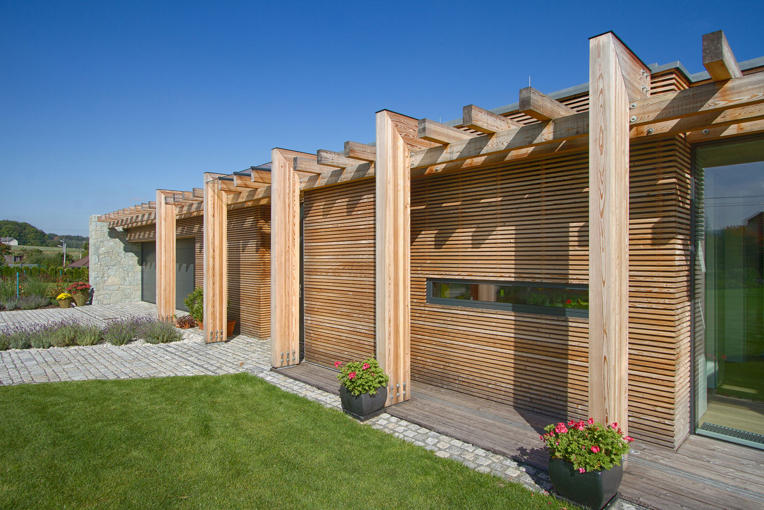 A Stylish Contemporary Home of Stone, Wood and Glass Elements in Palkovice, Czech Republic by Qarta Architektura (2)