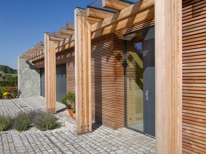 A Stylish Contemporary Home of Stone, Wood and Glass Elements in Palkovice, Czech Republic by Qarta Architektura (3)