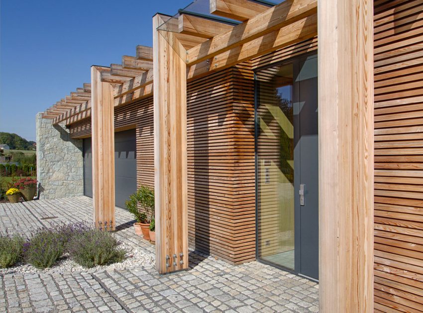 A Stylish Contemporary Home of Stone, Wood and Glass Elements in Palkovice, Czech Republic by Qarta Architektura (3)