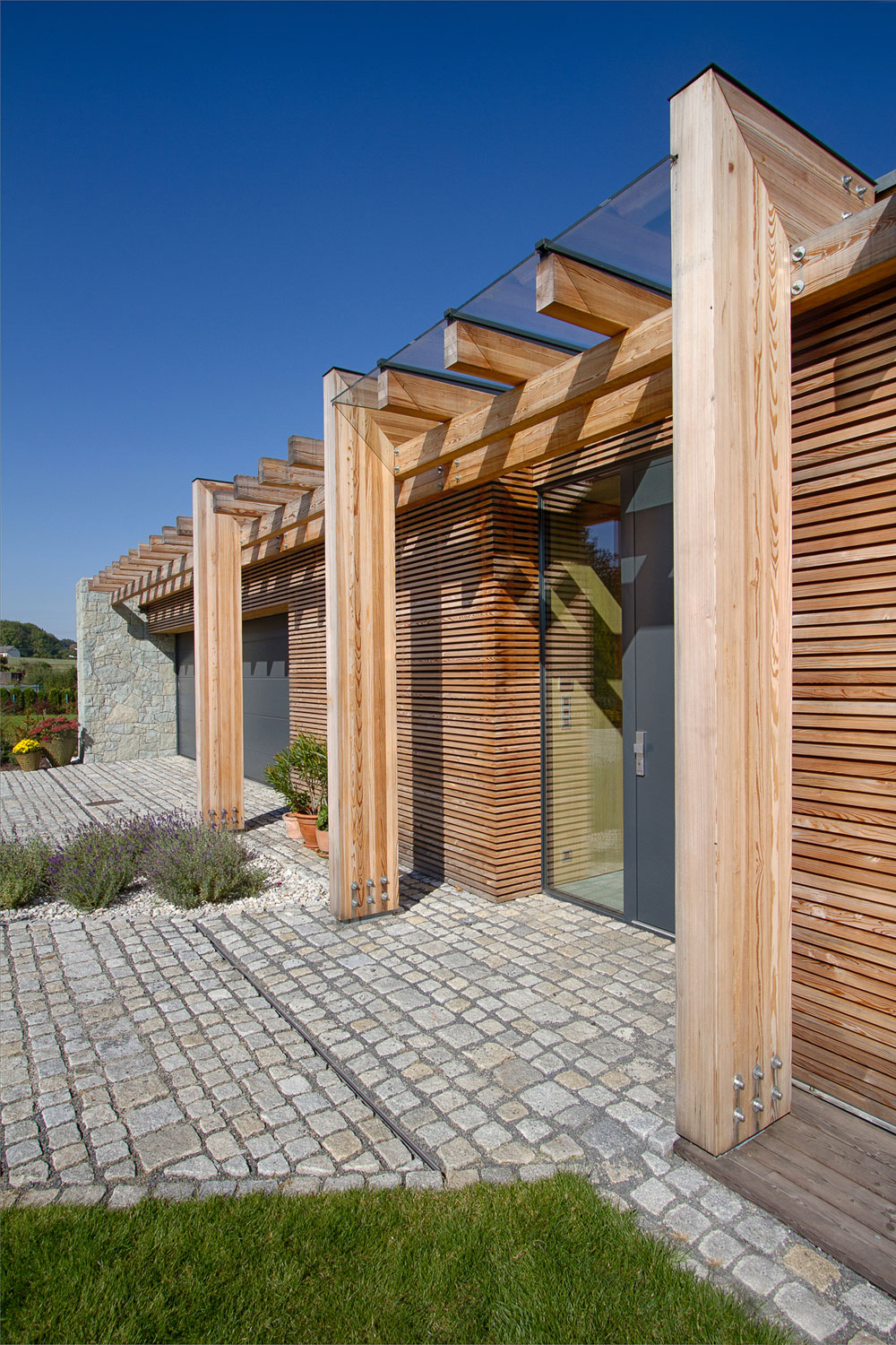 A Stylish Contemporary Home of Stone, Wood and Glass Elements in Palkovice, Czech Republic by Qarta Architektura (3)