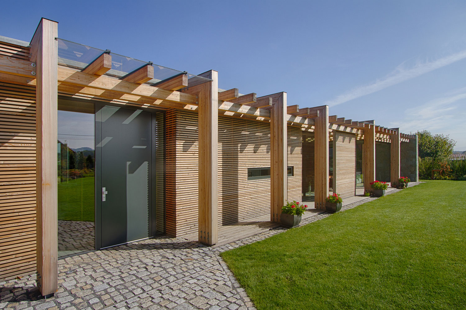 A Stylish Contemporary Home of Stone, Wood and Glass Elements in Palkovice, Czech Republic by Qarta Architektura (4)