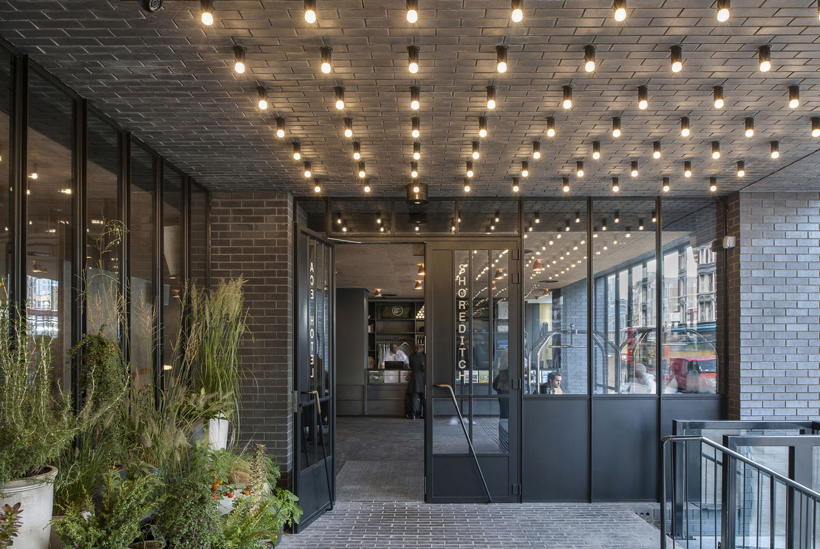 A Stylish Modern Hotel with New Facade and Dark Engineering Brick in Shoreditch by Universal Design Studio (1)