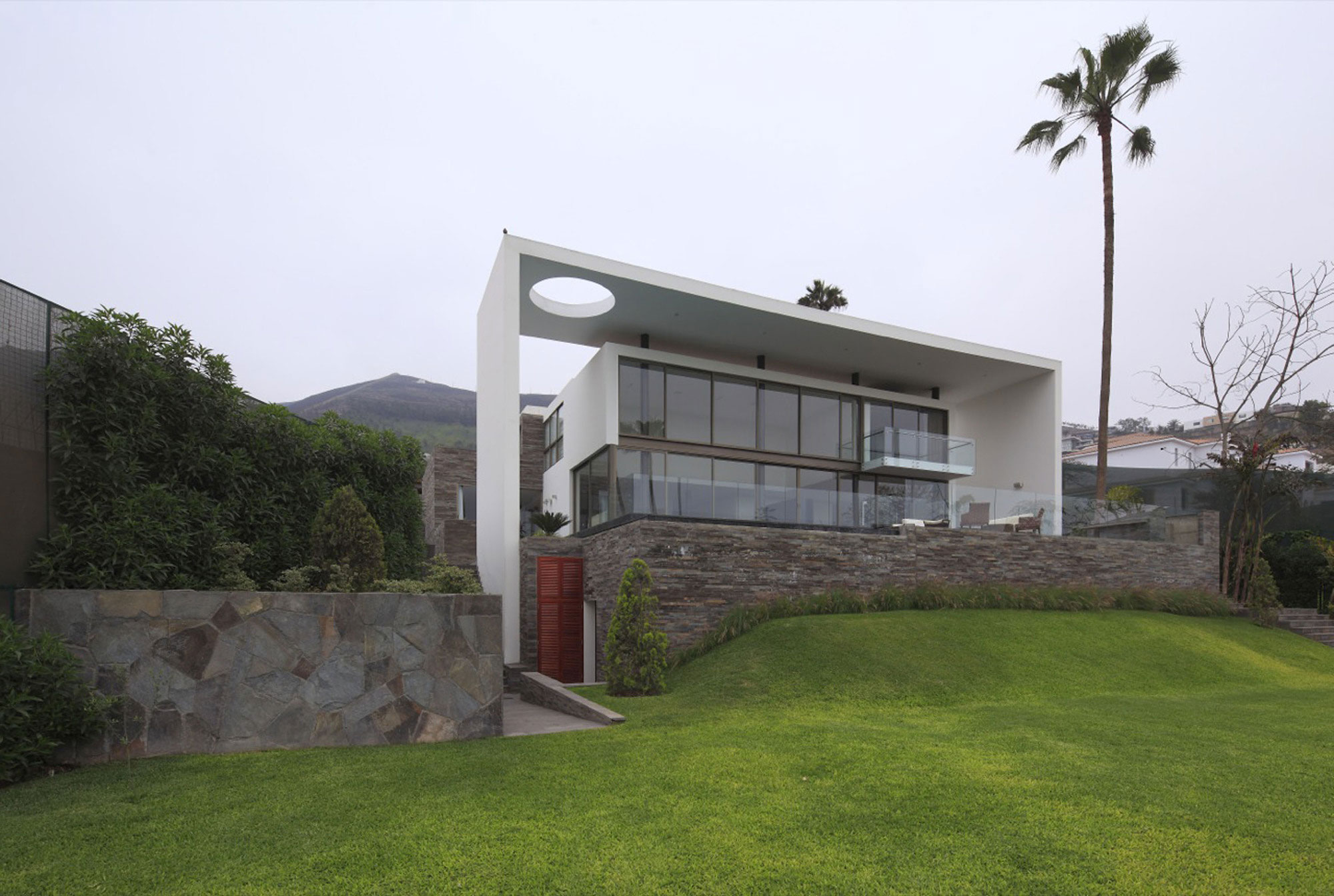 A Stylish Modern House Surrounded by Plants and Nature on the Hill in Lima by Jose Orrego (1)