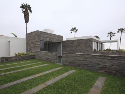 A Stylish Modern House Surrounded by Plants and Nature on the Hill in Lima by Jose Orrego (3)