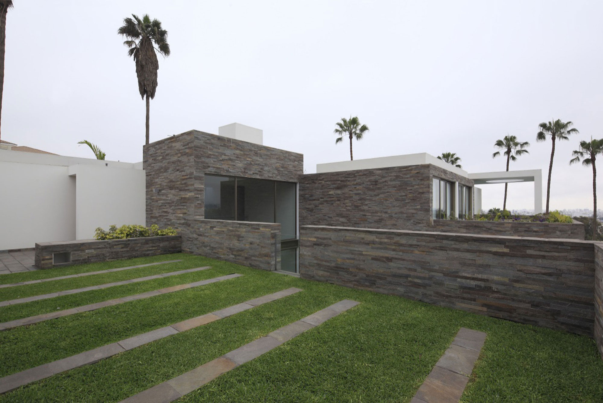 A Stylish Modern House Surrounded by Plants and Nature on the Hill in Lima by Jose Orrego (3)