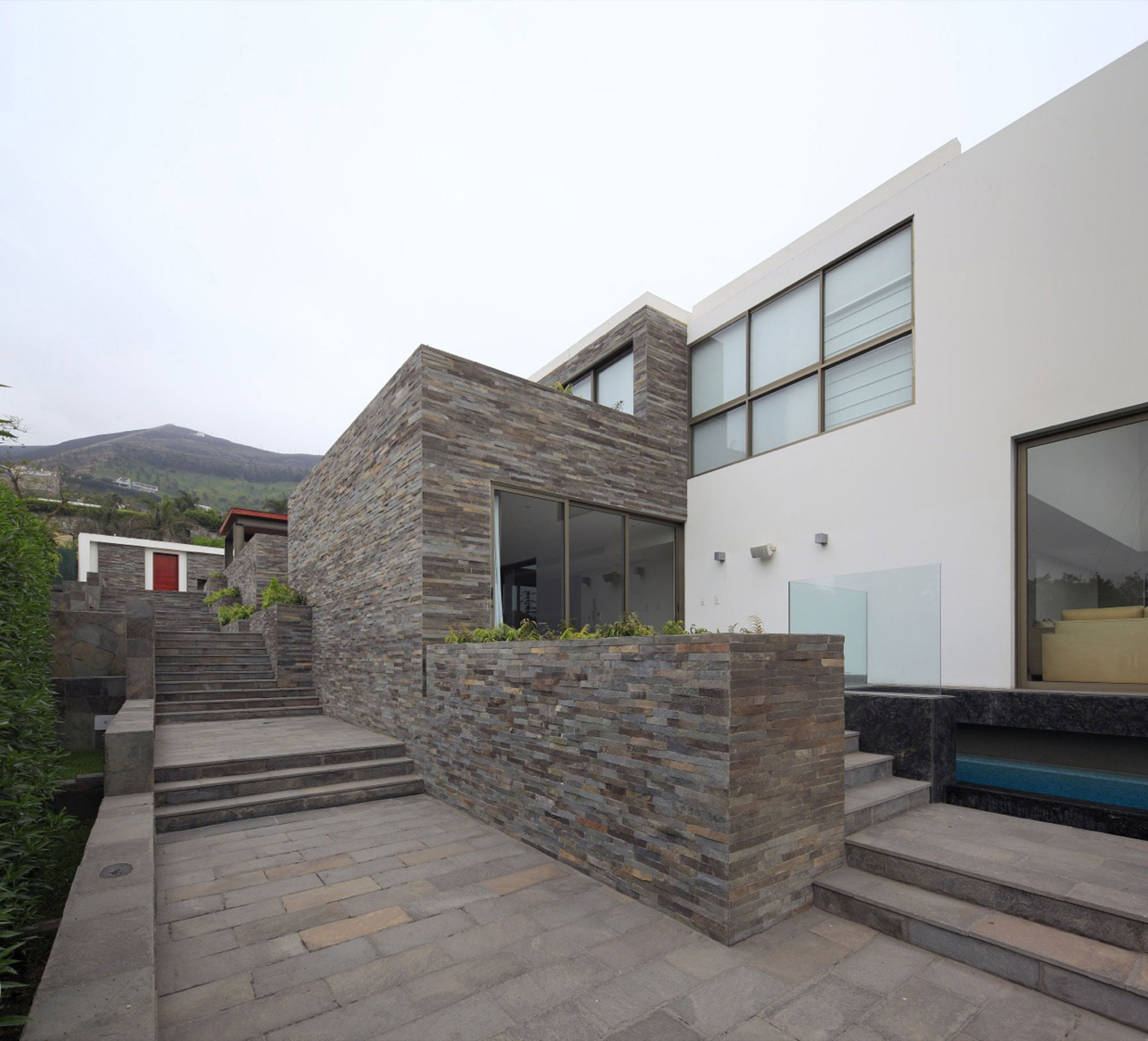 A Stylish Modern House Surrounded by Plants and Nature on the Hill in Lima by Jose Orrego (4)