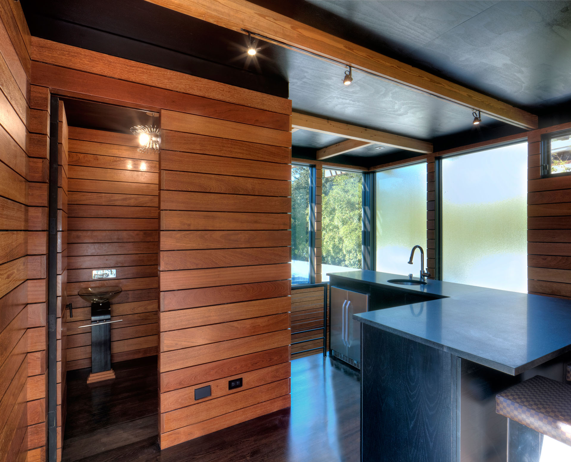 A Sustainable Contemporary Home with Stylish and Playful Interiors in San Antonio by John Grable Architects (28)