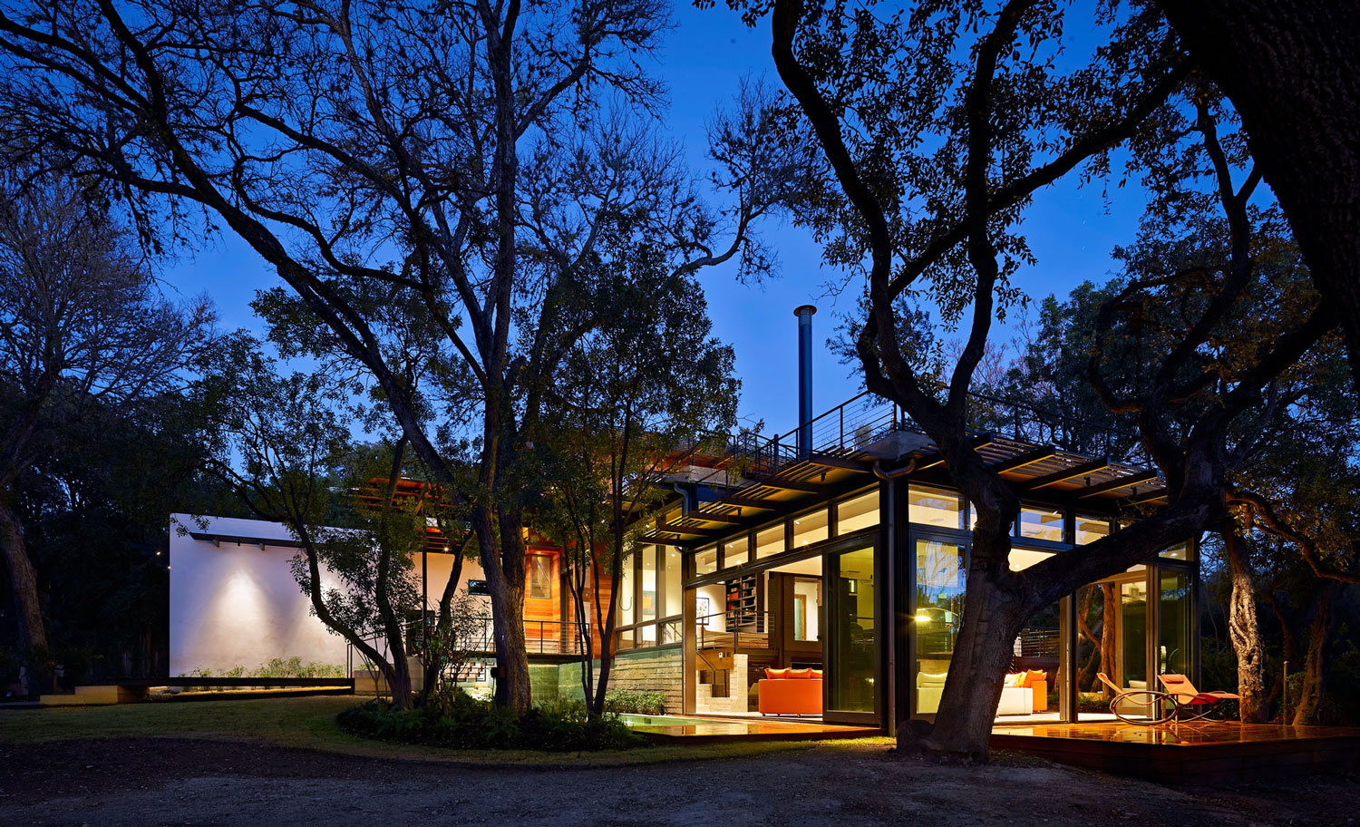 A Sustainable Contemporary Home with Stylish and Playful Interiors in San Antonio by John Grable Architects (31)