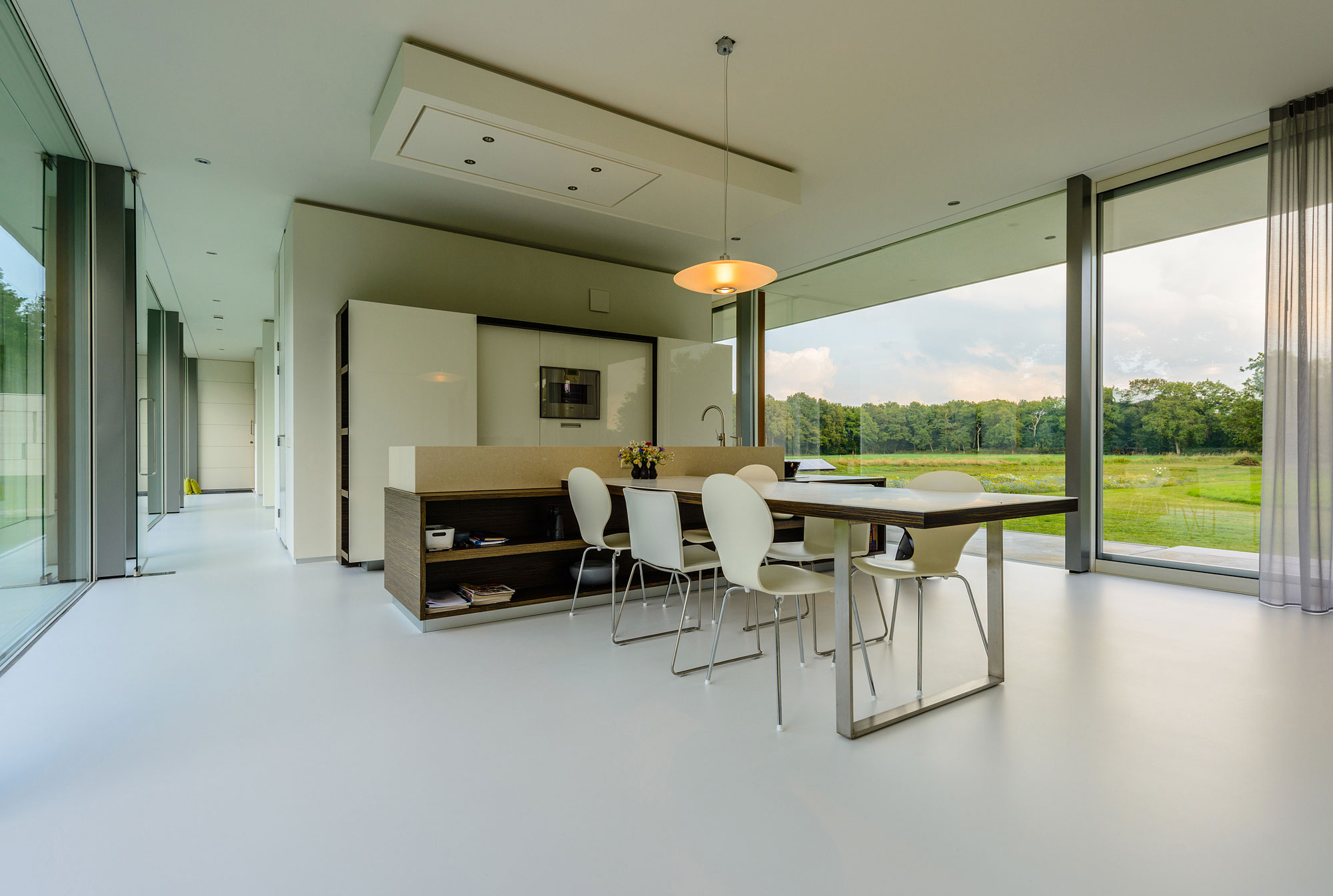 An Elegant and Captivating Modern Transparent House Behind a Grove of Trees in Bontebok, The Netherlands by Inbo (11)